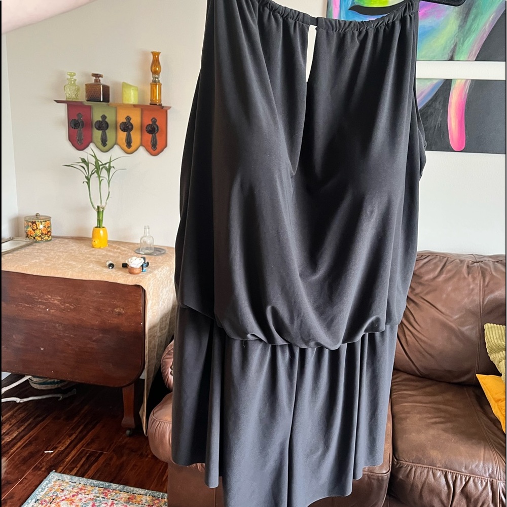 New black SWIM romper in new condition